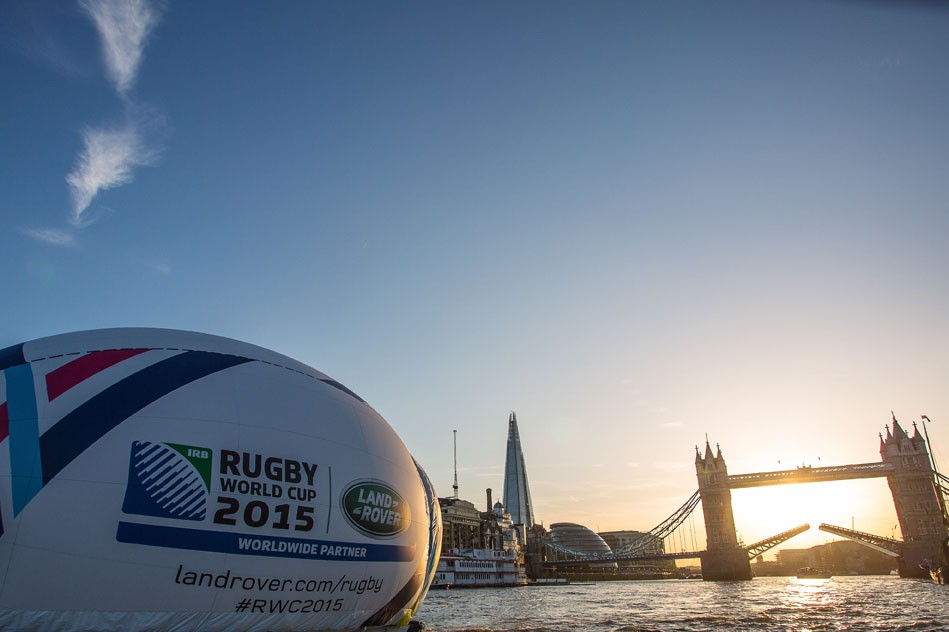 2015 Rugby World Cup - big rugby ball floating down the Thames by Tower Bridge