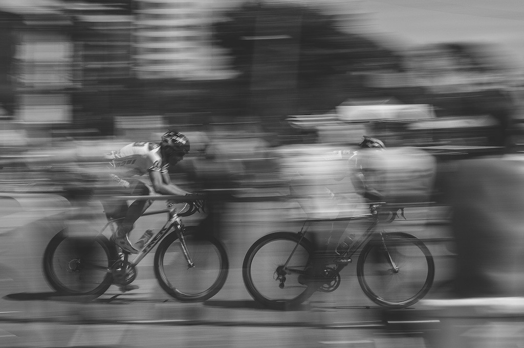 Blurred image of cycling race - black and white