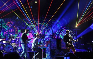 Coldplay on stage during Mylo Xyloto Tour