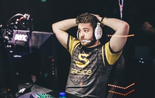 Esports player with hands on head