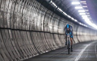 Chris Froome riding a Team Sky bike through the channel tunnel