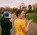 Woman in glasses clapping parkrun participants